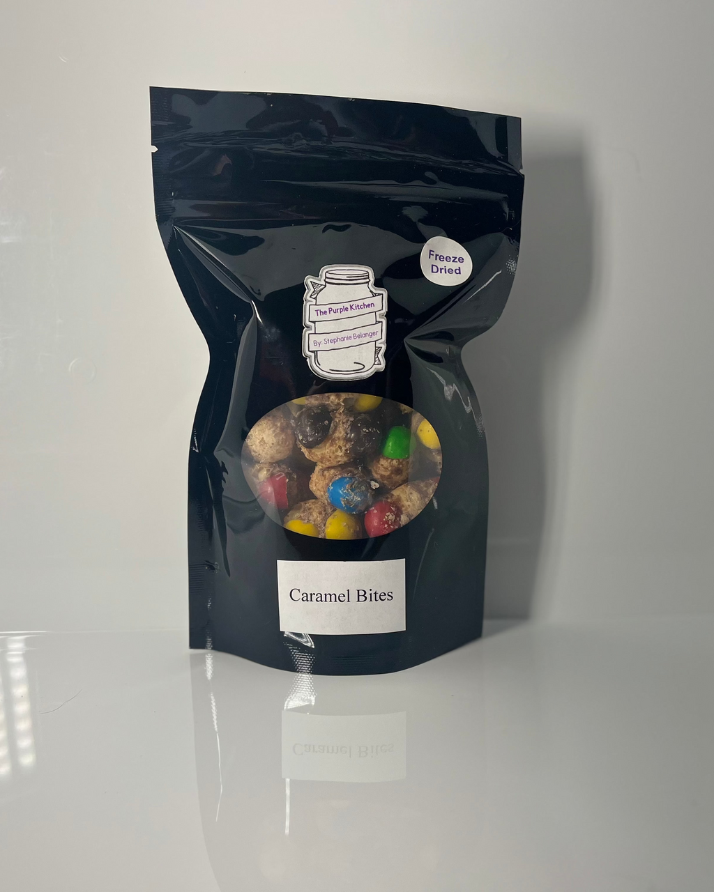 Black packaging of 'Caramel Bites' on a white background