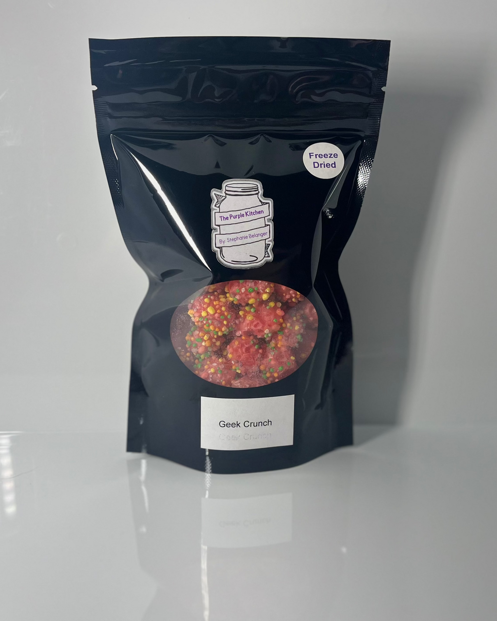 Black package of Geek Crunch on a white background