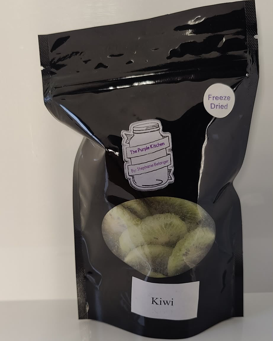 Black package of freeze dried kiwi on a white background