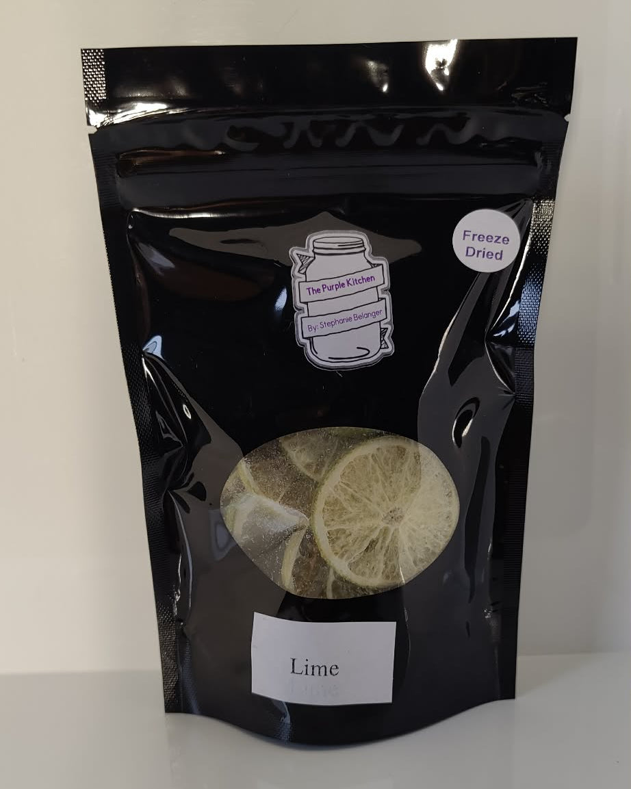 Black package of freeze dried limes on a white background